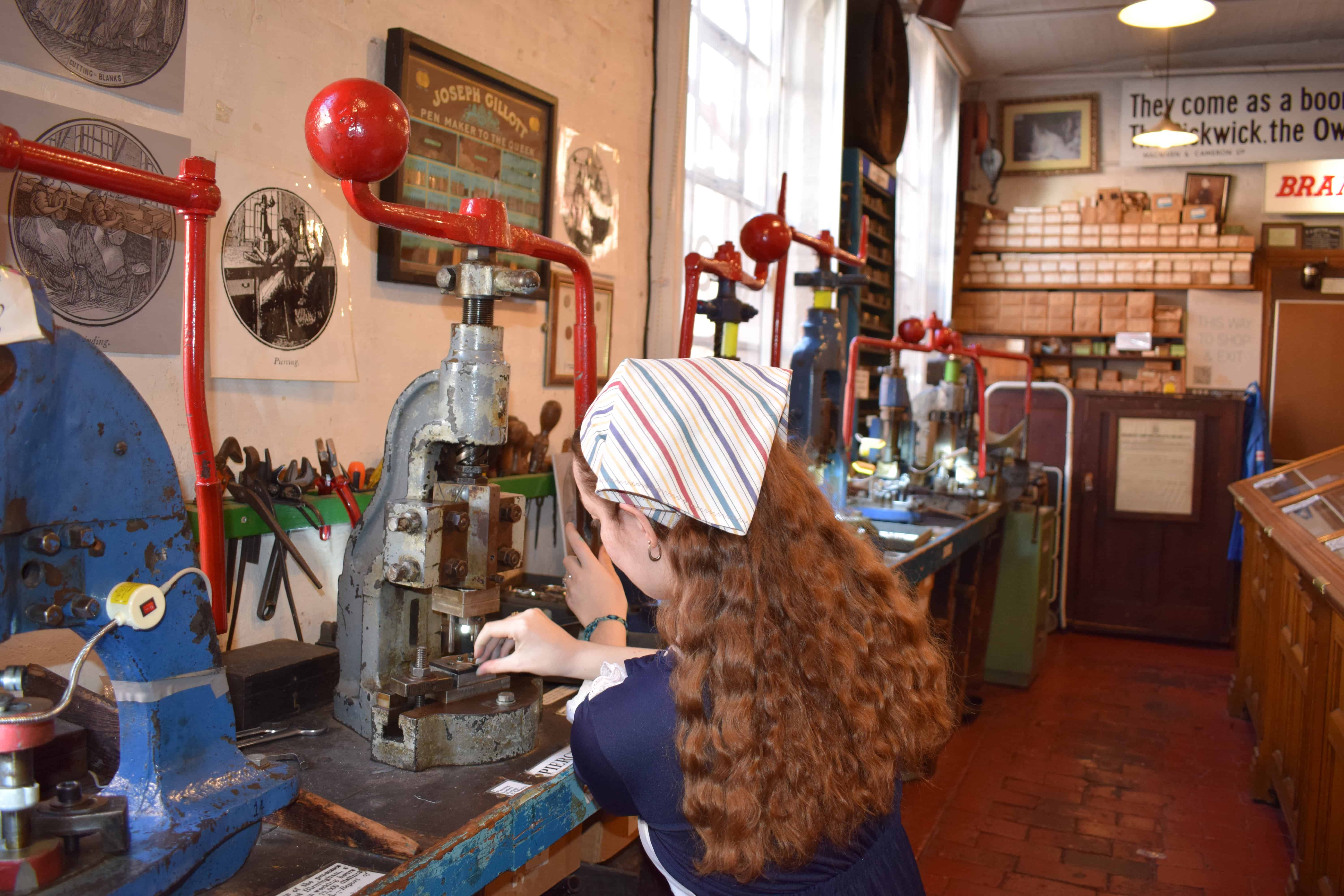 Pen Museum volunteer acts as a Victorian factory worker